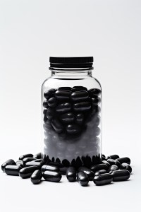 A close-up view of transparent capsules filled with granular supplement ingredients, representing precision and quality in supplement manufacturing processes