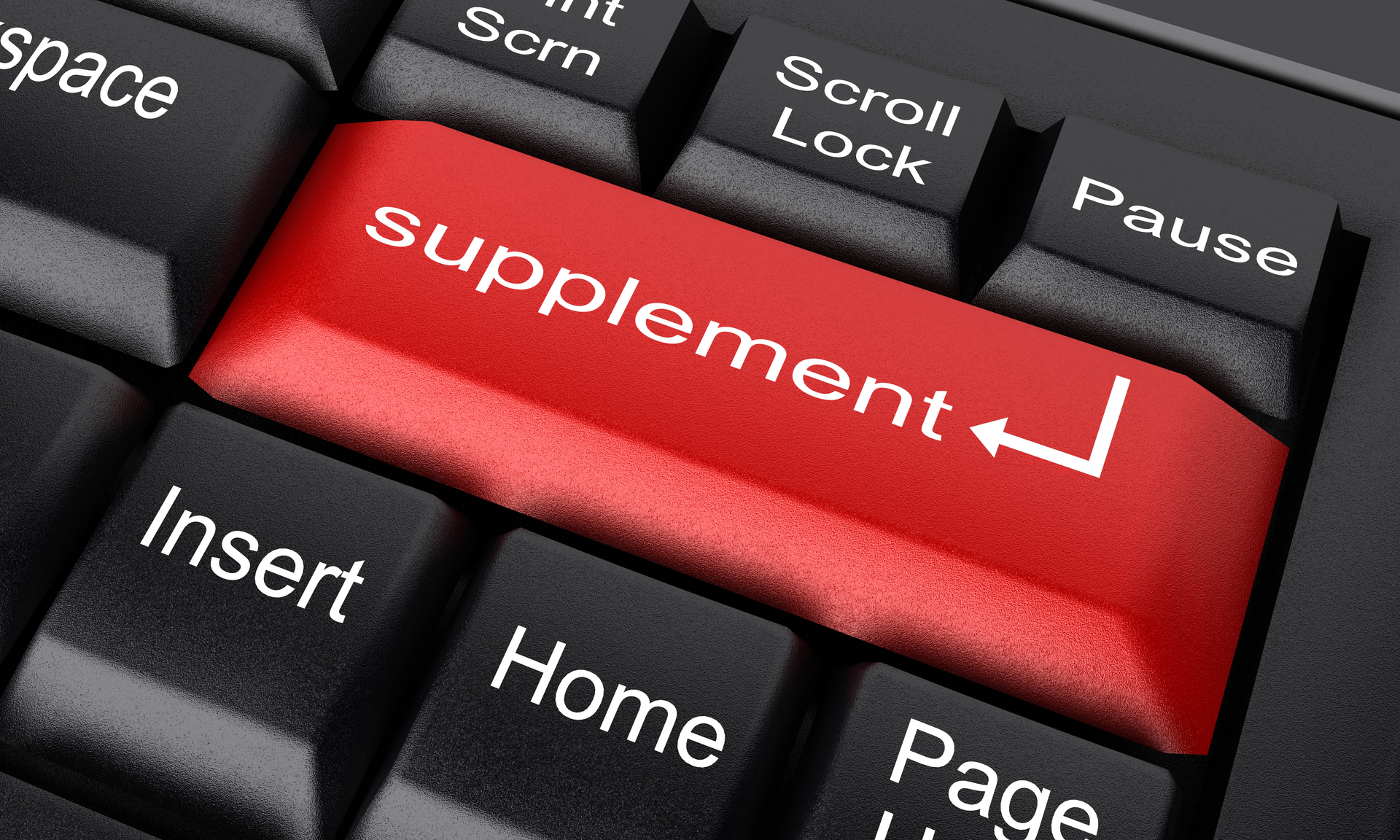 A close-up of a black keyboard featuring a prominent red key labeled 'supplement,' symbolizing an online platform or websites to buy supplements conveniently