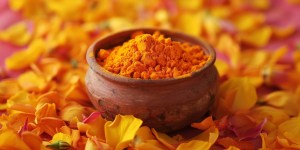 Private Label Turmeric powder displayed in a wooden bowl, showcasing high-quality natural ingredients for supplement branding.