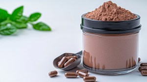 Jar of chocolate protein powder and brown supplement capsules on a white background, representing GMP Certified Supplements. Ideal for brands seeking cGMP certification for dietary supplements and showcasing products from a GMP certified manufacturer