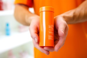 Orange Health Supplement Packaging in the form of a bottle